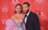 US singer-songwriter John Legend and his wife model Chrissy Teigen attend the 74th Annual Tony Award...