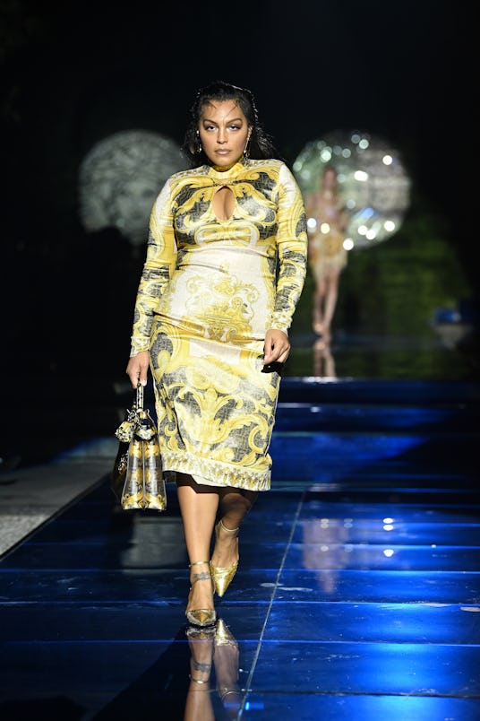 MILAN, ITALY - SEPTEMBER 26: Paloma Elsesser walks the runway at the Versace special event during th...