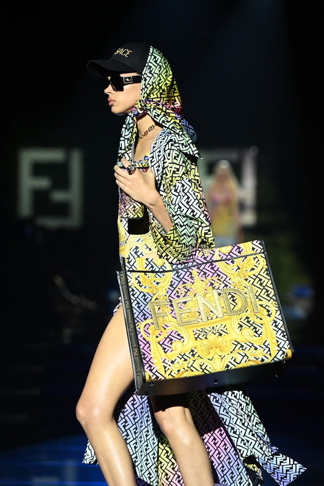 MILAN, ITALY - SEPTEMBER 26: A model walks the runway at the Versace special event during the Milan ...