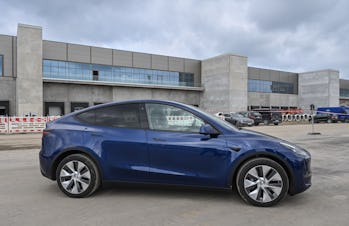01 September 2021, Brandenburg, Grünheide: A Tesla Model Y stands on the construction site of the Te...