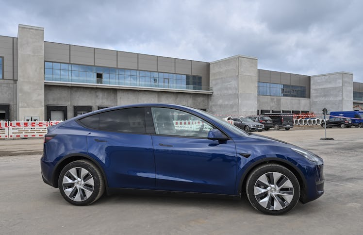 01 September 2021, Brandenburg, Grünheide: A Tesla Model Y stands on the construction site of the Te...