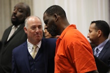 CHICAGO, IL -  SEPTEMBER 17:  Singer R. Kelly appears standing beside his attorney, Steven Greenberg...