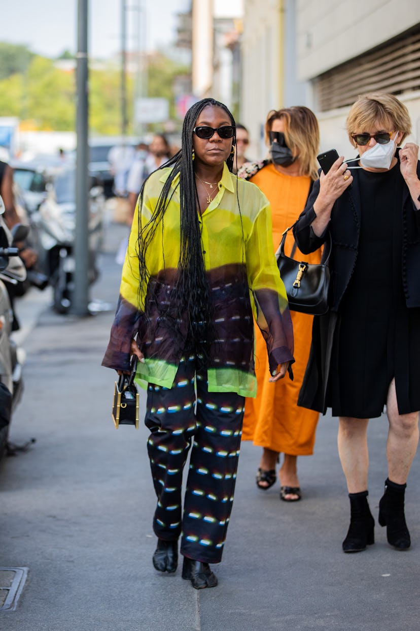 MILAN, ITALY - SEPTEMBER 23: A guest is seen outside Etro during the Milan Fashion Week - Spring / S...