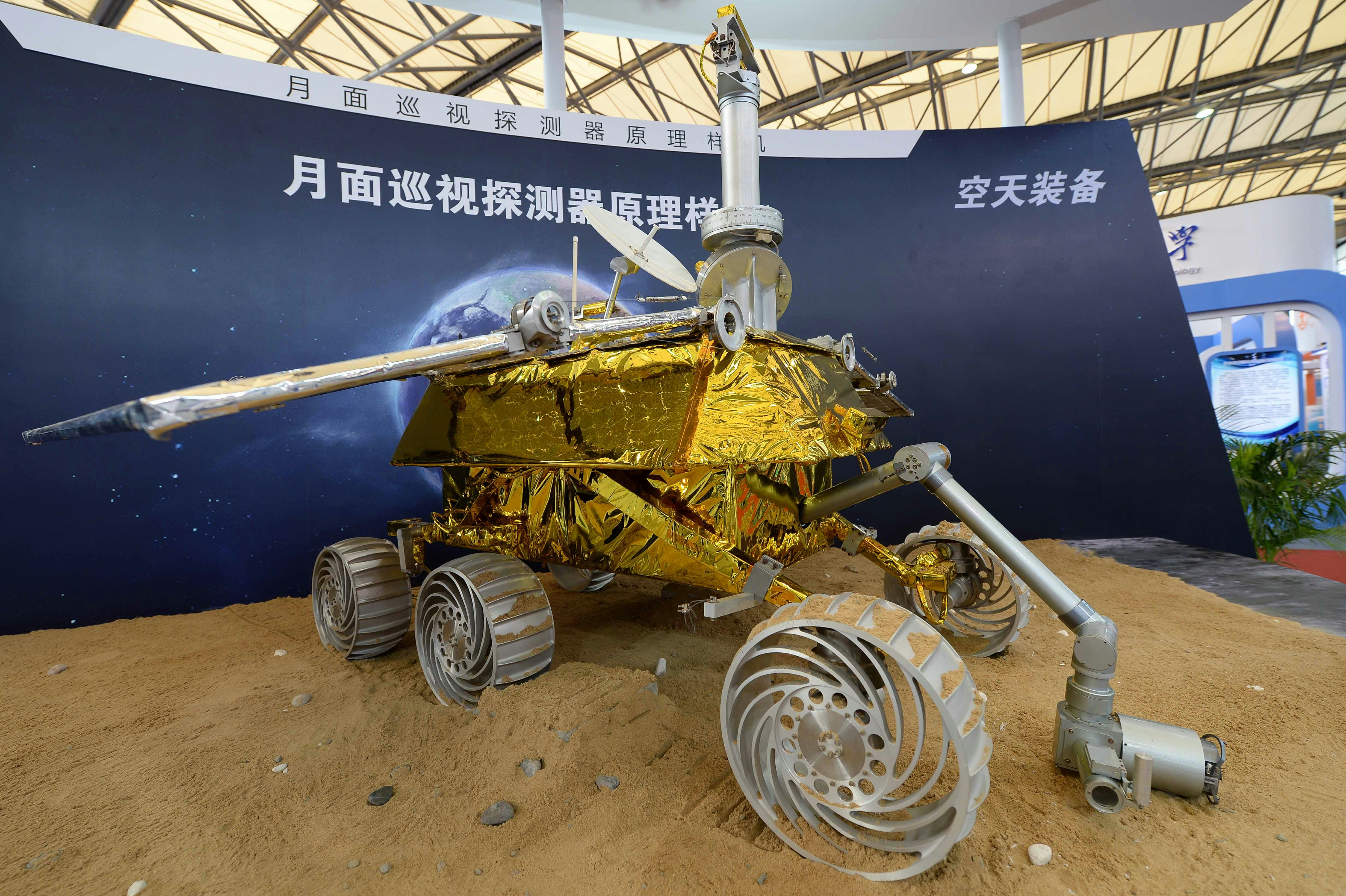 SHANGHAI, CHINA - NOVEMBER 05:  (CHINA OUT) A model of the Chang'e-3 lunar rover is on display durin...
