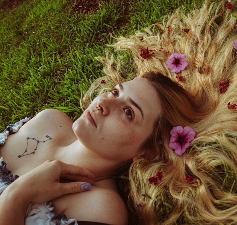 Halloween costume ideas for the cottagecore aesthetic include long, flowy dresses and lots of floral...