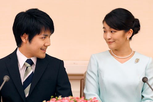 Princess Mako (R), the eldest daughter of Prince Akishino and Princess Kiko, and her fiancee Kei Kom...