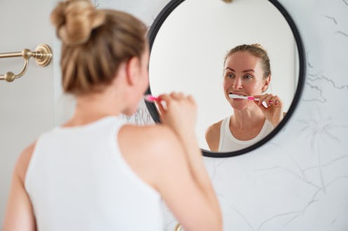 How to get rid of the white spots on your teeth, according to dentists.