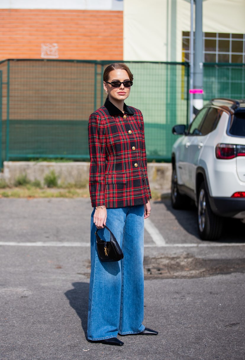 MILAN, ITALY - SEPTEMBER 23: Darja Igorewna Kljukina is seen outside Boss during the Milan Fashion W...