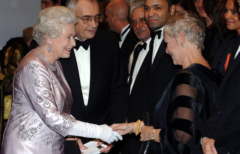 Queen Elizabeth chats with Dame Judi Dench.