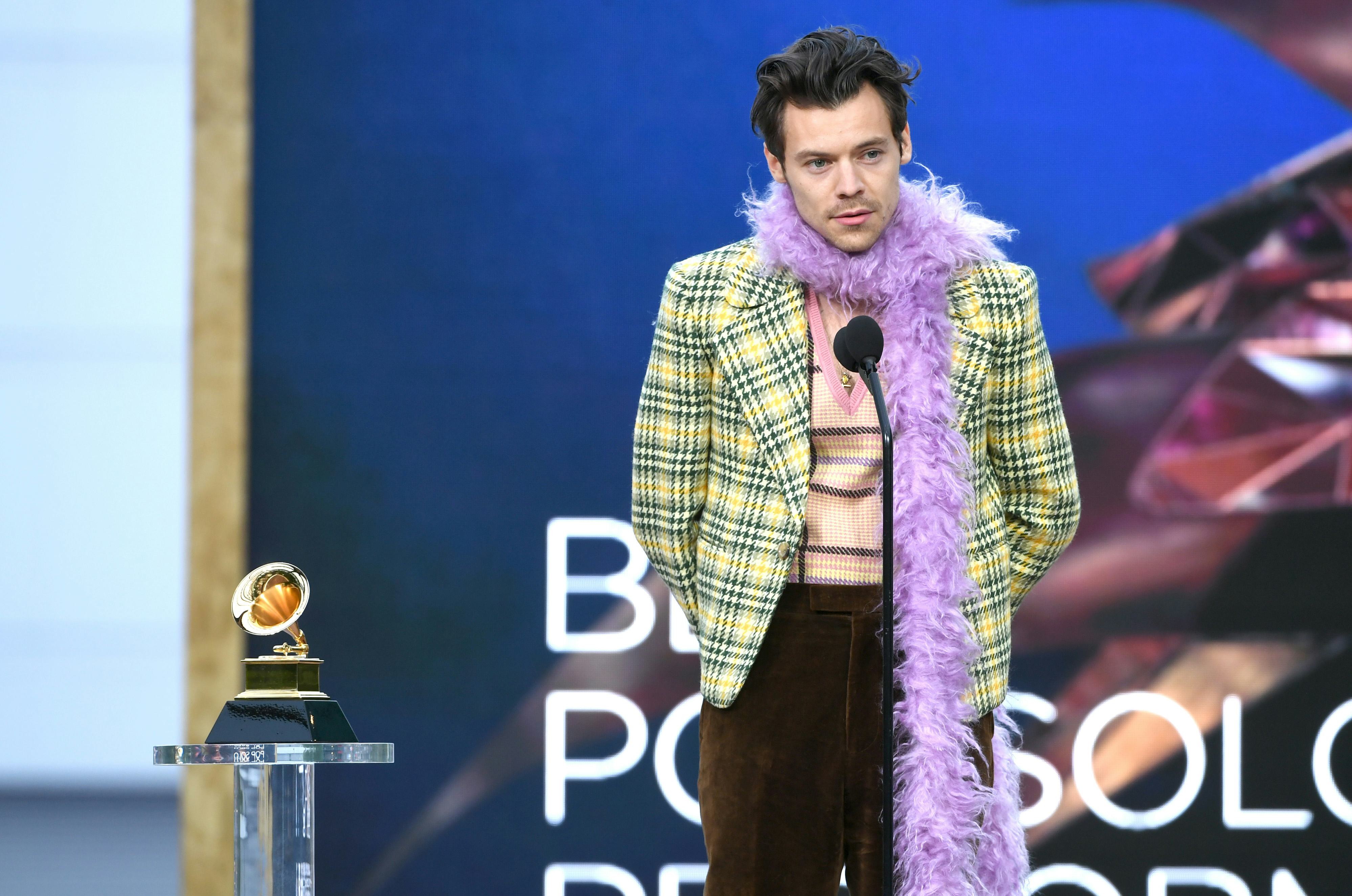 LOS ANGELES, CALIFORNIA - MARCH 14: Harry Styles accepts the Best Pop Solo Performance award for 'Wa...