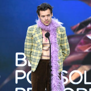 LOS ANGELES, CALIFORNIA - MARCH 14: Harry Styles accepts the Best Pop Solo Performance award for 'Wa...