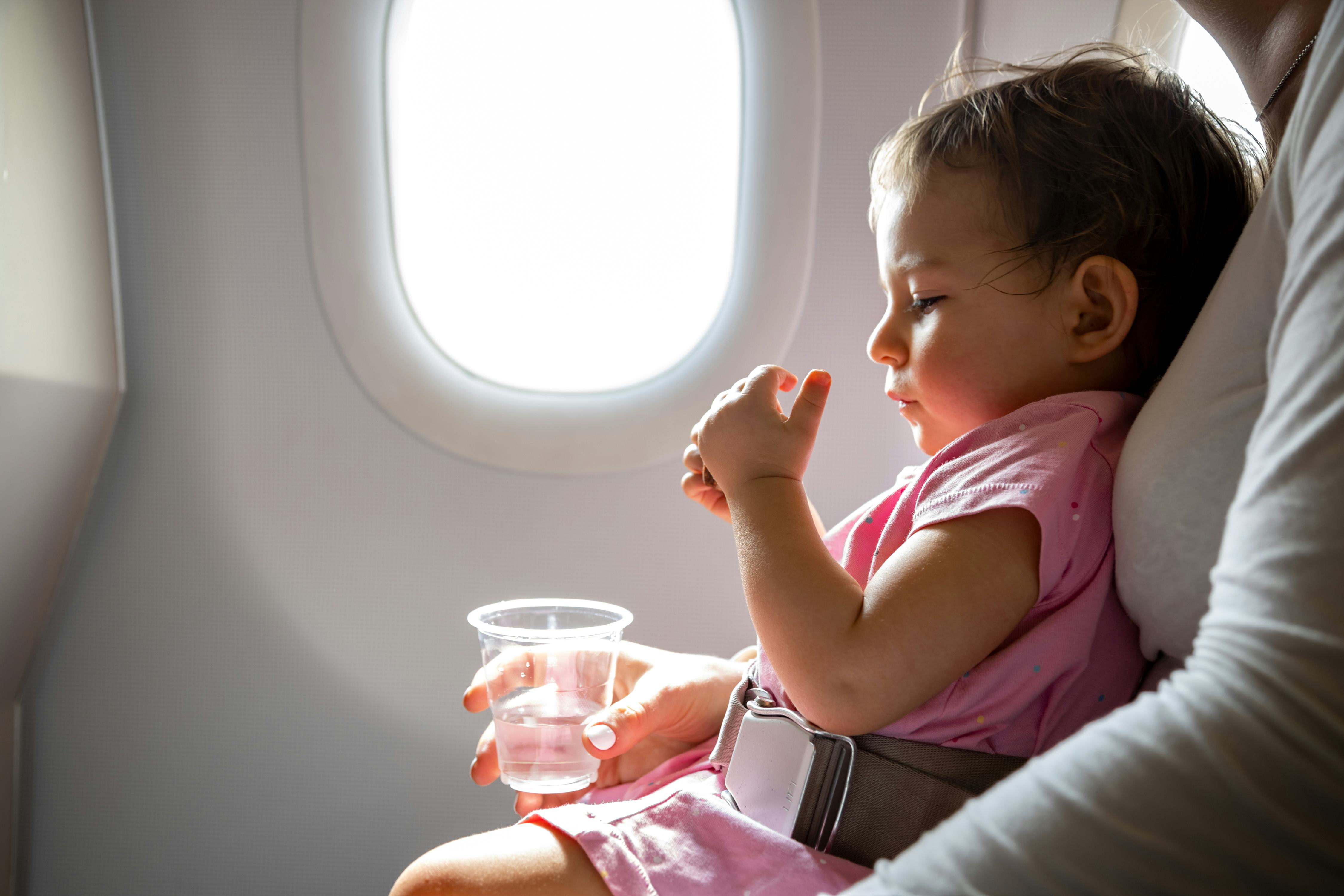 Checking a car outlet seat on a plane