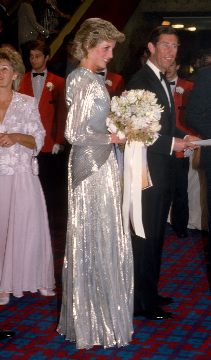 Prince Charles and Princess Diana attend a movie premiere together.