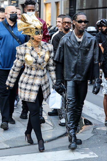 Cardi B Steps Out in a Schiaparelli Look Complete with a Liquid Gold Helmet