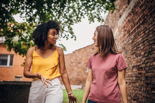 Two women walking and talking and forgetting a word. Here's why you're forgetting words more than us...