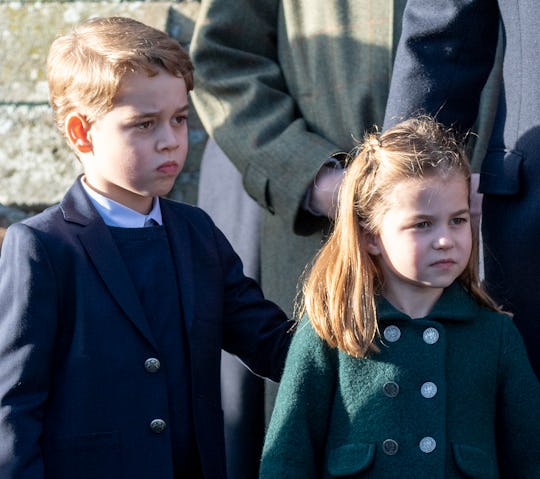 KING'S LYNN, ENGLAND - DECEMBER 25: Prince George of Cambridge and Princess Charlotte of Cambridge a...