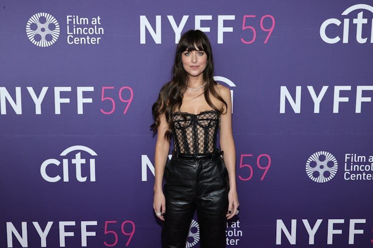 NEW YORK, NEW YORK - SEPTEMBER 29: Dakota Johnson attends the premiere of "The Lost Daughter" during...
