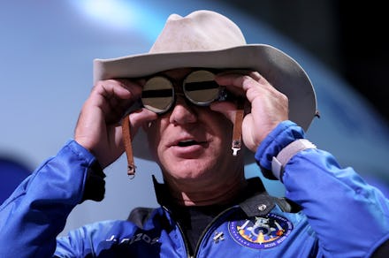 VAN HORN, TEXAS - JULY 20: Jeff Bezos holds the aviation glasses that belonged to Amelia Earhart as ...