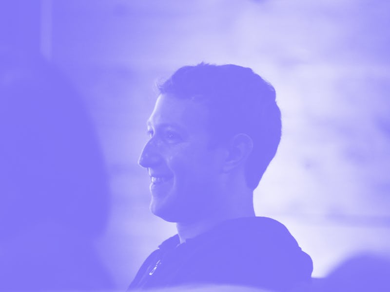 Facebook CEO Mark Zuckerberg listens to Kevin Systrom (not shown), Instagram CEO and co-founder, spe...