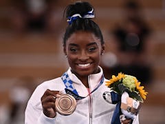 Simone Biles posted a blunt Instagram note addressing haters calling her a quitter.