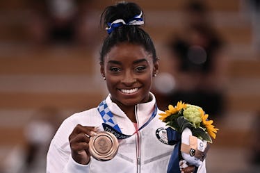 Simone Biles posted a blunt Instagram note addressing haters calling her a quitter.