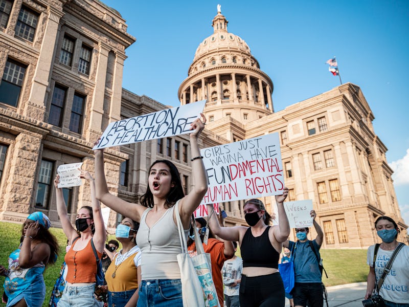 AUSTIN, TX - SEPT 1: Pro-choice protesters march outside the Texas State Capitol on Wednesday, Sept....