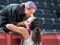 TOKYO, JAPAN August 8: Sue Bird #6 of the United States  is congratulated by partner US soccer playe...