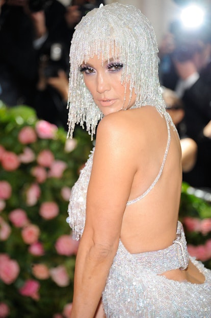 For 2019's Camp-themed Met Gala, J.Lo wore a silver beaded and sequined wig. 