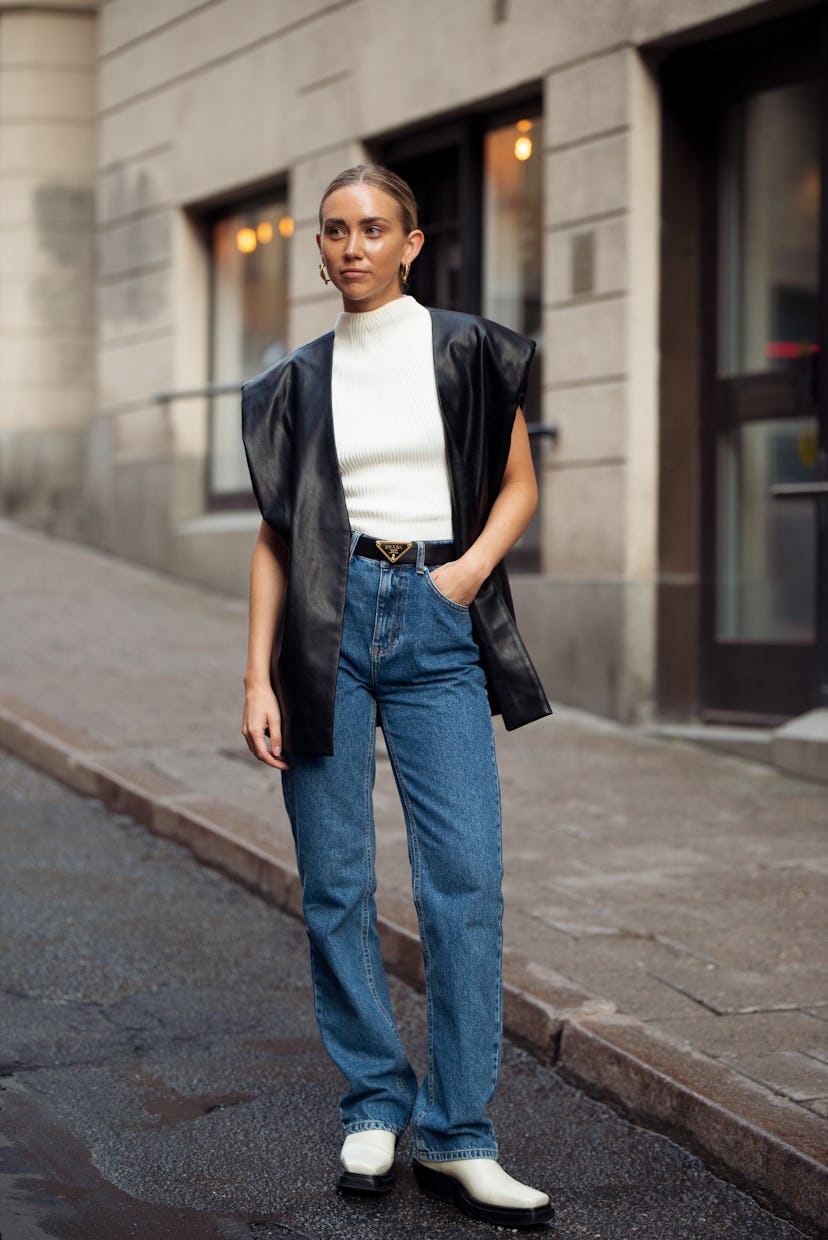 STOCKHOLM, SWEDEN - SEPTEMBER 01: Lisa Olsson wearing blue jeans, white top and black leather vest o...