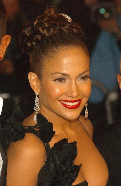 Jennifer Lopez's braided hairstyle at the 2004 Met Gala. 