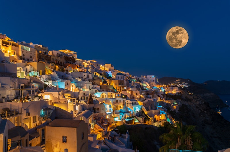 This is a photo of Oia in Santorini, Greece. The island is popular dues to its majestic views and un...
