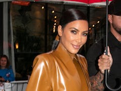 PARIS, FRANCE - MARCH 01: Kim Kardashian West is seen leaving the L'Avenue restaurant on March 01, 2...