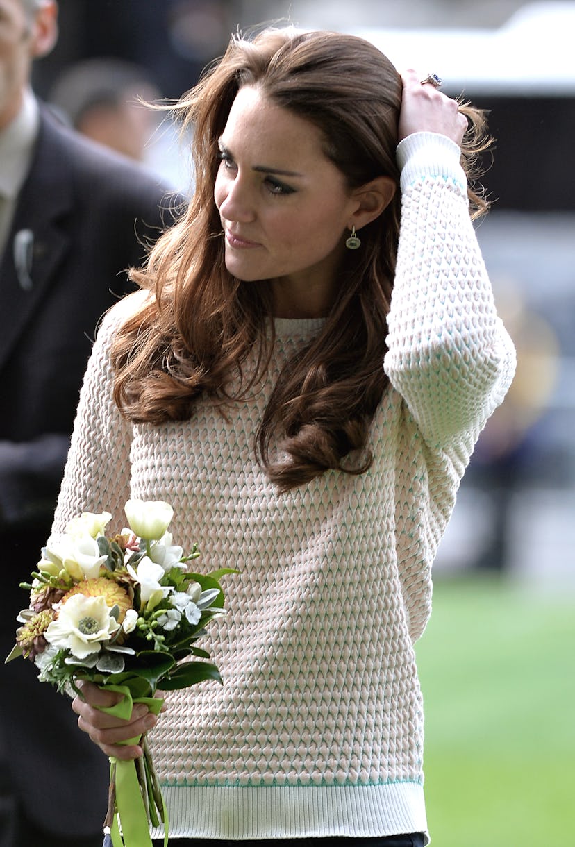 Kate Middleton wears a fisherman knit sweater.