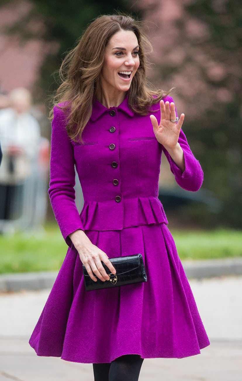 Kate Middleton wore a royal purple coat.