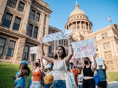 Pro-choice protesters march outside the Texas State Capitol on Wednesday, Sept. 1, 2021 in Austin, T...