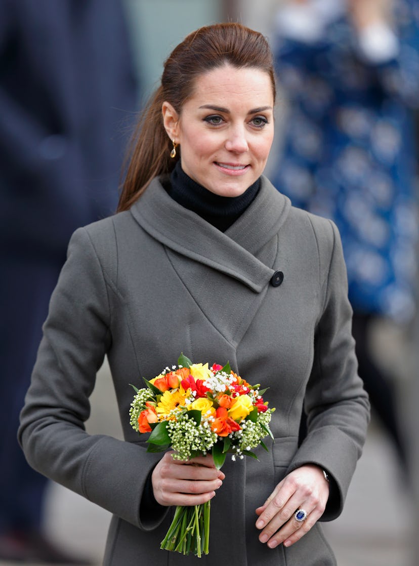 Kate Middleton goes for a military style jacket.
