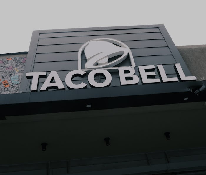 NEW YORK, NEW YORK - JULY 21: A Taco Bell restaurant stands along a Queens street on July 21, 2021 i...