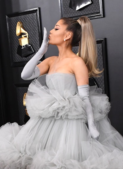 Ariana Grande wearing a Barbie ponytail, one of the biggest Y2K hairstyle trends to know.