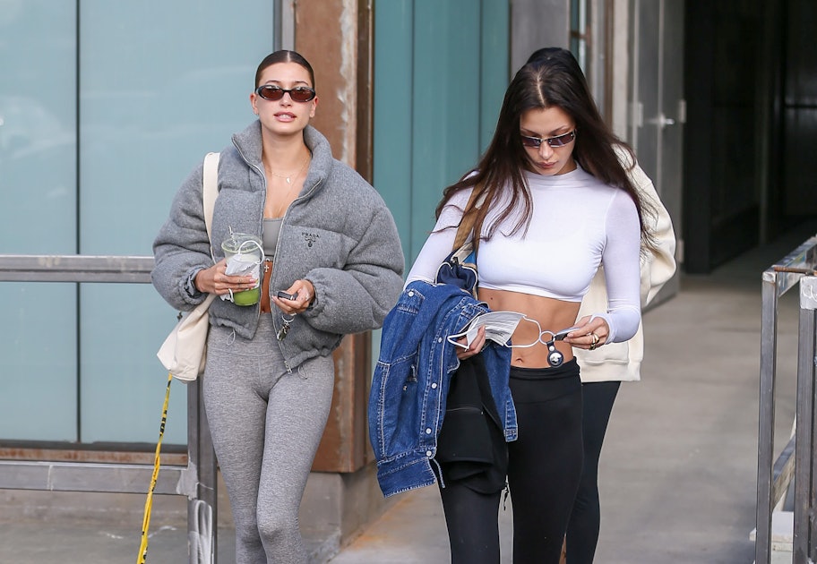 Hailey Bieber's Pilates Look Features Prada Puffer Jacket And Belly Chain