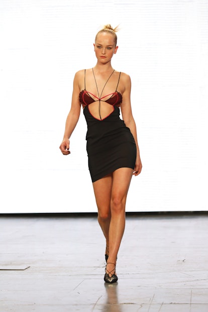 LONDON, ENGLAND - SEPTEMBER 17: A model walks the runway at the Nensi Dojaka show during London Fash...