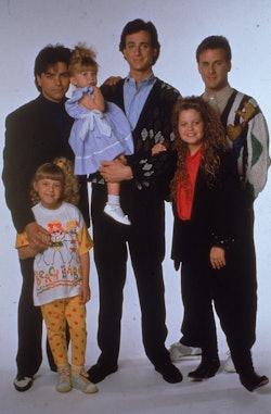 Portrait of the cast of the television program, 'Full House,' (left - right): John Stamos, Jodie Swe...