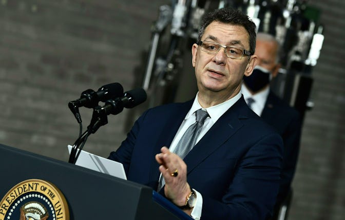 US President Joe Biden listens to Pfizer CEO Albert Bourla speak at the Pfizer Kalamazoo Manufacturi...