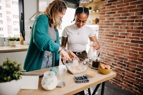 A couple makes brunch at home. Here's your Mercury Retrograde horoscope for mercury retrograde winte...