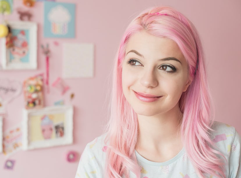 A woman shops for kawaii room decor to bring the kawaii pink aesthetic to her home.