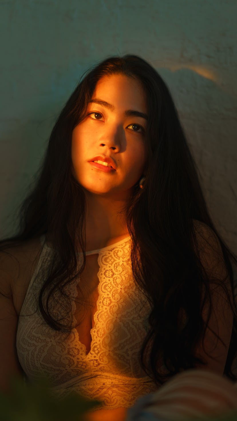 A woman stares at the camera during Mercury retrograde winter 2022.