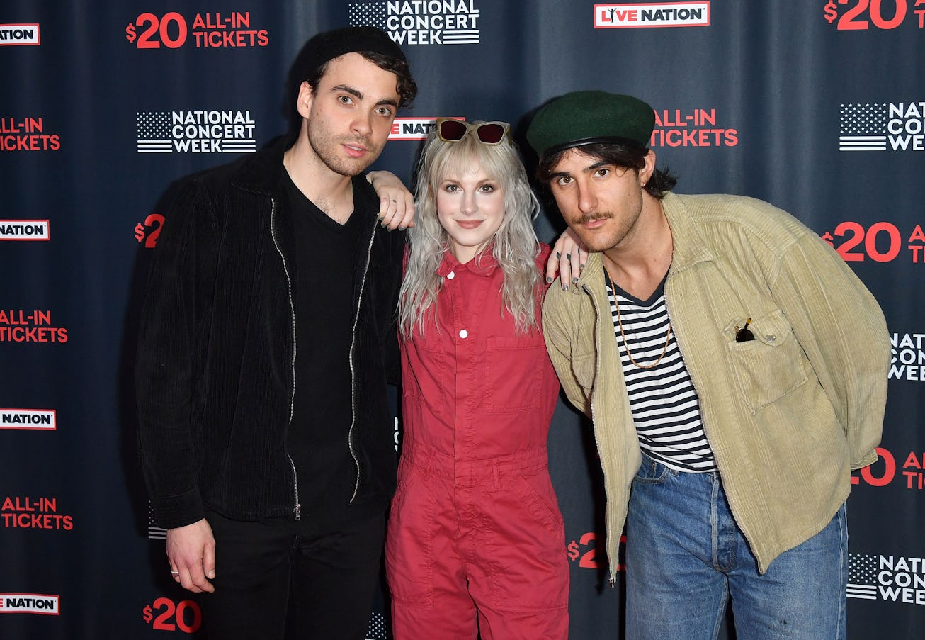 (L-R) Taylor York, Hayley Williams, and Zac Farro of Paramore attend Live Nation's celebration of th...