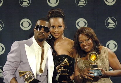 Kanye West and Brooke Crittendon with his mother, Donda.