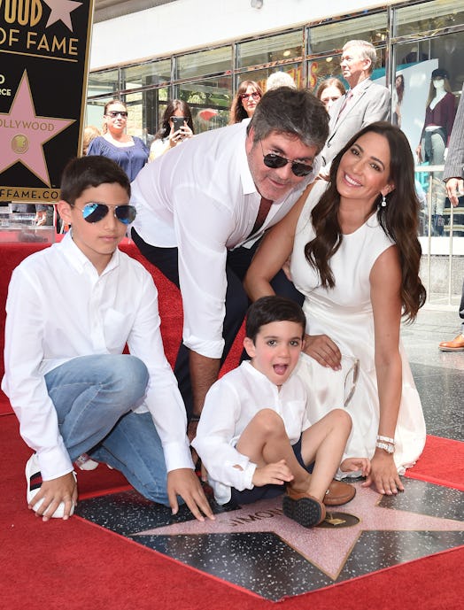 Simon Cowell, Lauren Silverman, Eric Cowell and Adam Silverman attend the ceremony honoring Simon Co...