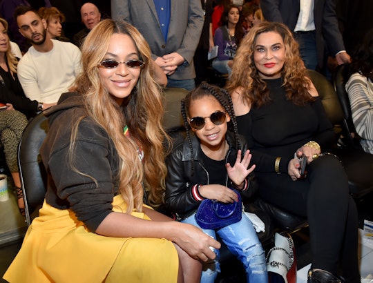 LOS ANGELES, CA - FEBRUARY 18:  (L-R) Beyonce, Blue Ivy Carter, and Tina Knowles attend the 67th NBA...