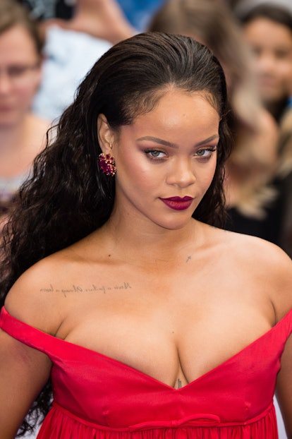 Rihanna has a small cross tattoo on her collarbone. 